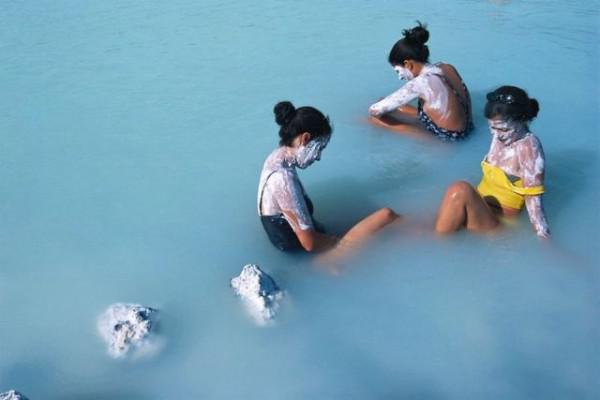iceland-blue-lagoon-italian-women-sitting-in-hot-spring-with-silica-rich-mud-applied-on-skin iceland-blue-lagoon-italian-women-sitting-in-hot-spring-with-silica-rich-mud-applied-on-skin