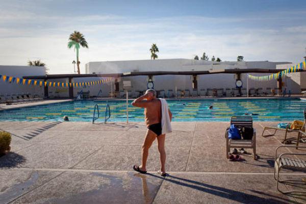 a-man-heads-in-after-swimming-laps-and-sunning-at-the-bell-recreation-center-in-sun-city-arizona-december-15-2009-the-warm-climate-makes-outdoor-recreation-possible-year-round