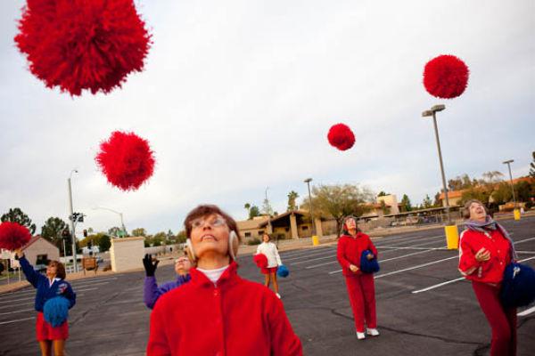 the-sun-city-poms-marching-unit-practices-for-an-upcoming-parade-in-a-parking-lot-outside-of-a-recreation-center-in-sun-city-arizona-decmeber-10-2009 the-sun-city-poms-marching-unit-practices-for-an-upcoming-parade-in-a-parking-lot-outside-of-a-recreation-center-in-sun-city-arizona-decmeber-10-2009